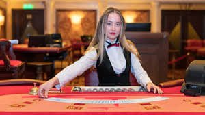 jago888 live-dealer Kembang Kempis table with multiple player seats and professional dealer